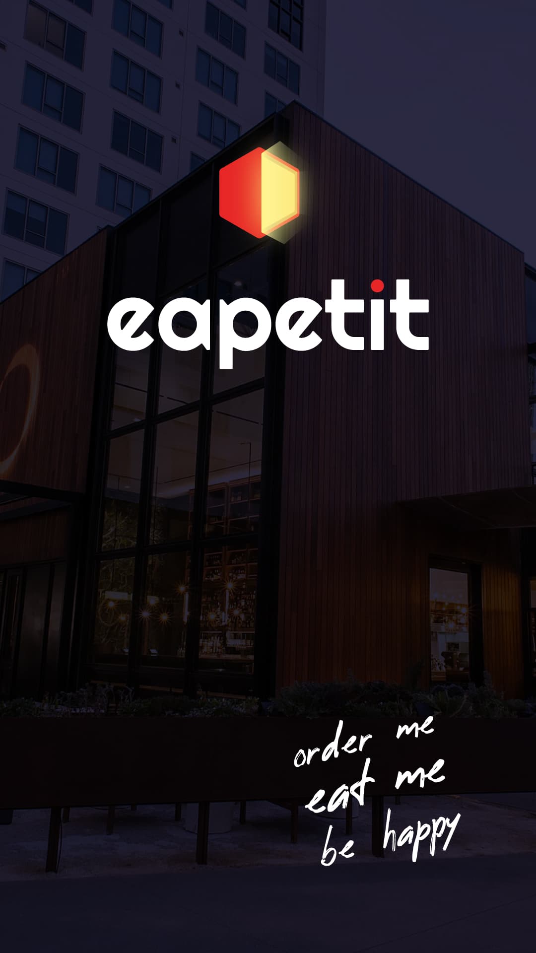 Simulare a logo-ului luminos e-Apetit montat pe fațada unei clădiri.